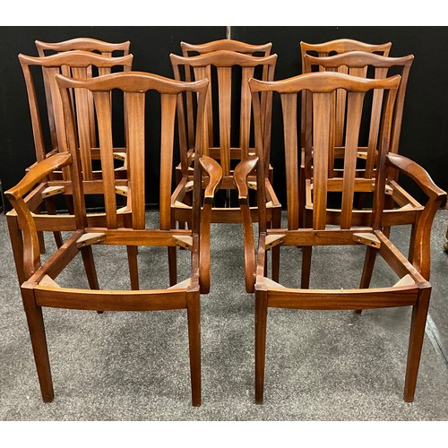 127 - A set of eight G-plan dining chairs, two carvers and six chairs (the seat pads have been removed as ... 