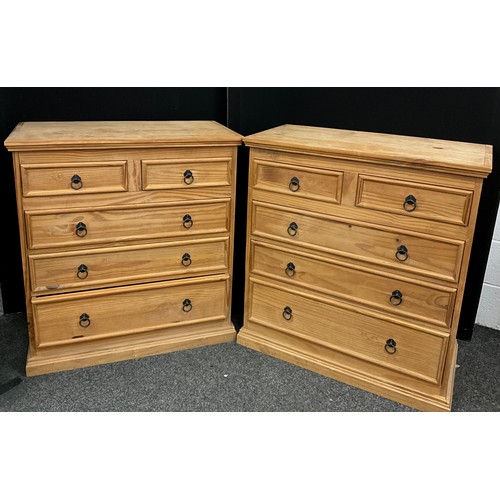 131 - A pair of pine chests of drawers, each having two short, above three long drawers, 94.5cm high x 87.... 