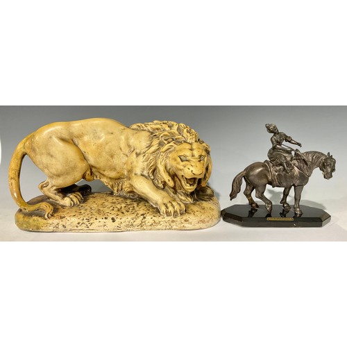 66 - A moulded plaster model of a prowling lion, snarling open mouth, 45cm wide, early 20th century; a Fr... 