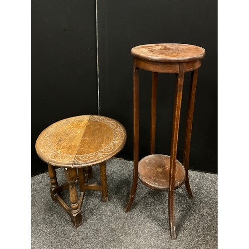 132 - A Victorian mahogany plant stand, 95.5cm high x 34cm diameter;  an oak drop-leaf side table, (2).