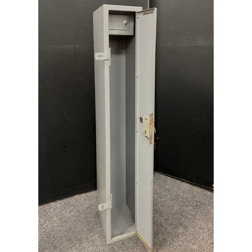 135 - A metal floor standing Gun cabinet, with internal lockable ammunition compartment, 148cm high x 23cm... 