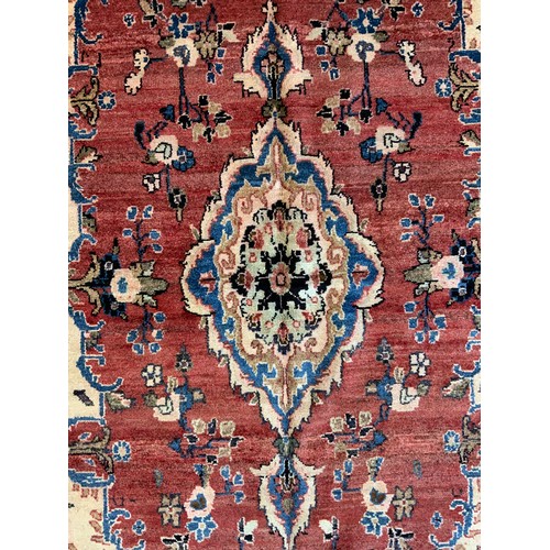 139 - A North West Persian Mahal Rug, in tones or cream, blue, red and yellow, 245cm x 140cm