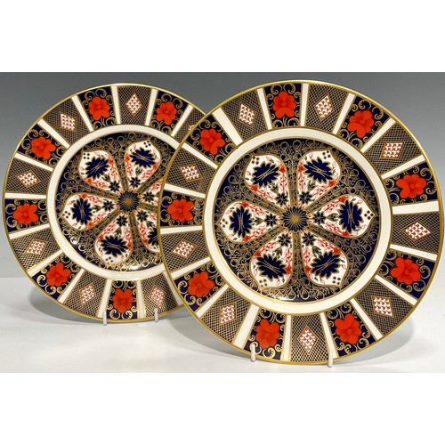 78 - A pair of Royal Crown Derby Imari 1128 pattern dinner plates, 27cm diameter, printed mark in red, fi... 