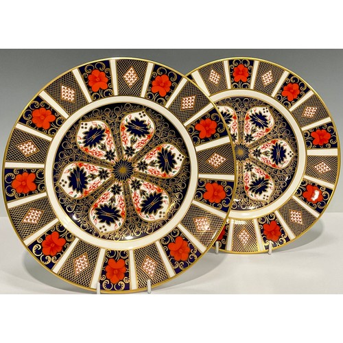 78 - A pair of Royal Crown Derby Imari 1128 pattern dinner plates, 27cm diameter, printed mark in red, fi... 