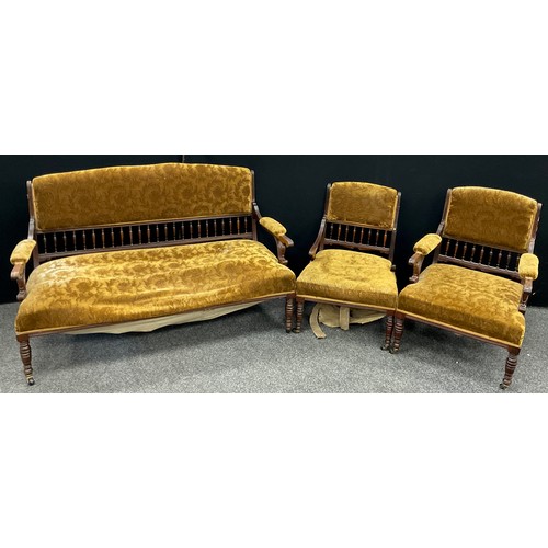 166 - An early Victorian Rosewood sofa, and two armchairs, sprung and stuff-over seat, stuff-over backs, a... 