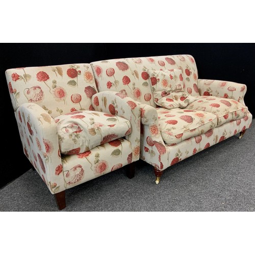 173 - A mid century design two seat sofa and conforming pair of tub armchairs, the sofa measuring 85cm hig... 