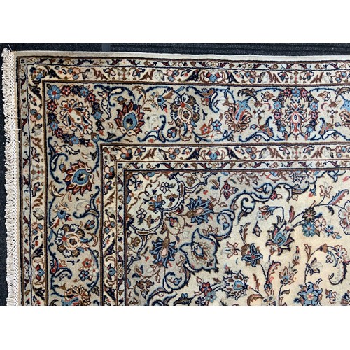 190 - A Central Persian Kashan garden Carpet, all over decorated with floral sprays in red, blue, green on... 