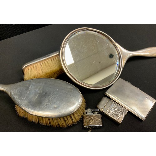 246 - Silver - a small cigarette case, Birmingham 1929;  matched dressing table set, mirror, brush and hai... 