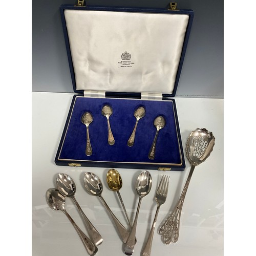 254 - Flatware - An Edwardian silver floral pierced bowl straining spoon, George Ellis, Sheffield 1910;  c... 