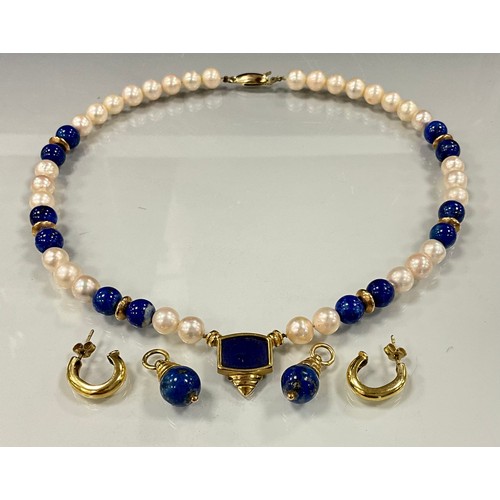 290 - An Australian cultured pearl lapis lazuli and gold bead necklace and earrings suit, the necklace wit... 