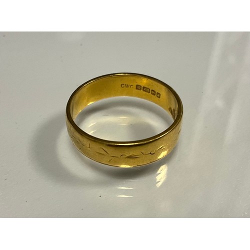 305 - A 22ct gold textured wedding band, size Q, 5.6g