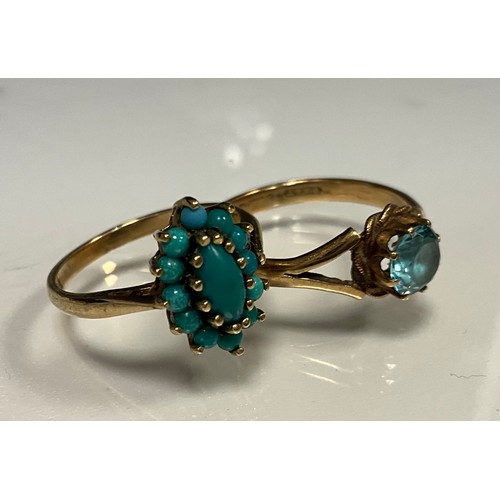 310 - A 9ct gold turquoise navette cluster ring, size P, 3g gross;  a topaz paste 9ct gold dress ring, siz... 