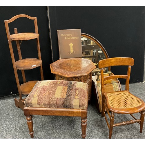 194 - Anglo Indian carved octagonal table, a child’s cane rattan chair, cake stand, looking glass; etc