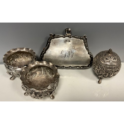 289 - Silver - a pair of Indian silver coloured metal open salts, embossed with deities;  similar floral g... 