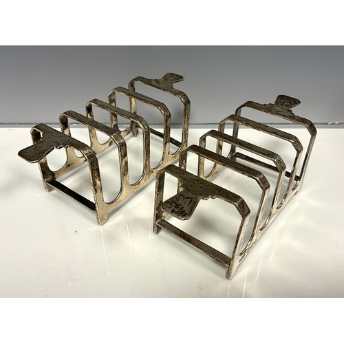 317 - A pair of George V silver Art Deco four division toast racks, Walker & Wall, Sheffield 1941, 101.6g,... 