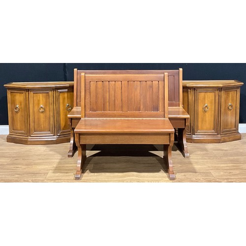 611 - A pair of oak hall settles, each with hinged seat, the largest 89cm high, 126cm wide, the other 86.5... 