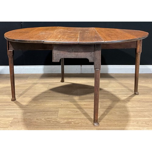 621 - A 19th century oak dropleaf dining table