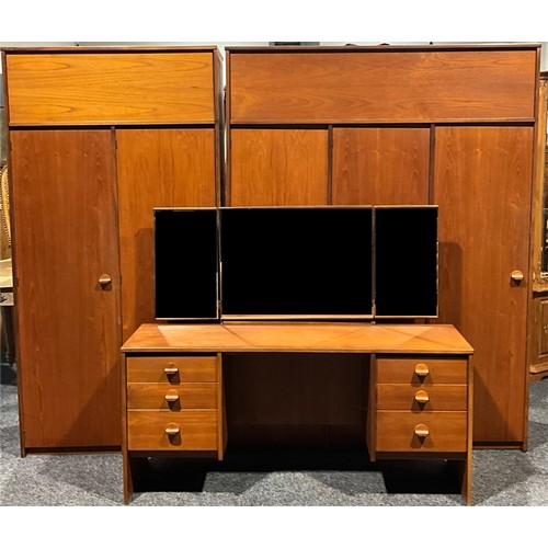 633 - A Stag Cantata teak three-piece bedroom suite, comprising wardrobes and dressing table, the wardrobe... 