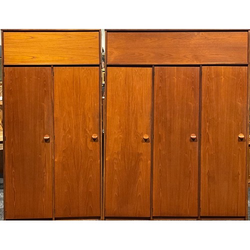 633 - A Stag Cantata teak three-piece bedroom suite, comprising wardrobes and dressing table, the wardrobe... 