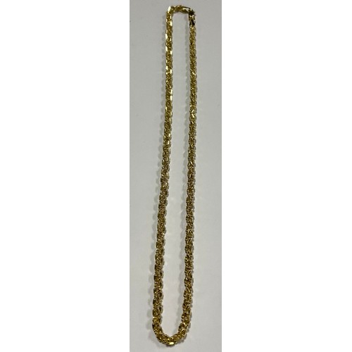 571 - A 14k gold Midas necklace, marked, 13.4g