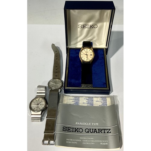 573 - A Seiko wristwatch, boxed with papers; other Seiko wristwatches (3)