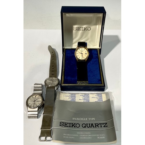 573 - A Seiko wristwatch, boxed with papers; other Seiko wristwatches (3)