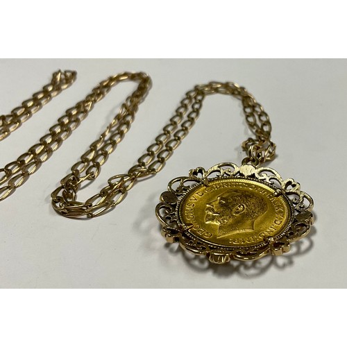 574 - A George V sovereign pendant necklace, 1911, Canada mint, 9ct gold mount and chain, 18.6g gross