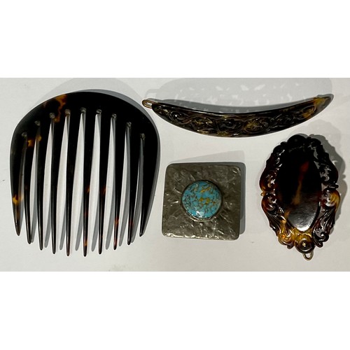 578 - Lady's Accessories - a large tortoiseshell hair slide, 10cm long; others; an Arts and Crafts brooch,... 