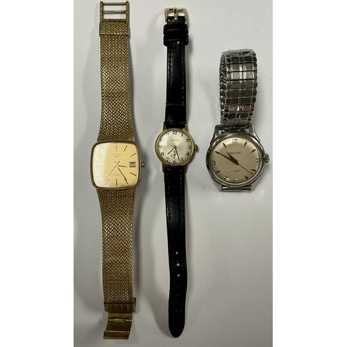 584 - A Zenith gold plated lady's watch, Arabic numerals, subsidiary seconds dial, black leather strap; a ... 