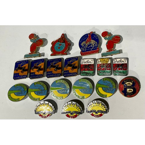 595 - A collection of 1960's Butlins enamel pin badges, including Beavers Club, Minehead, Barry Island, et... 