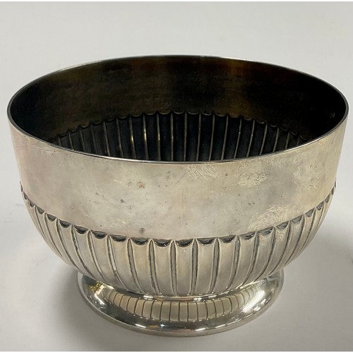 598 - A Victorian silver sugar bowl, stop fluted, monogrammed, 7cm high, Walter & John Barnard, London 188... 