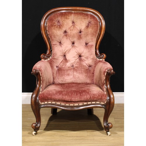 658 - A Victorian mahogany button back armchair, c.1880