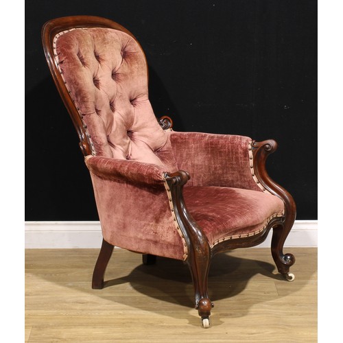 658 - A Victorian mahogany button back armchair, c.1880