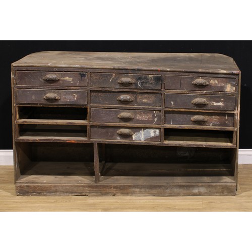 659 - Industrial Salvage - a printer’s or workshop chest, 88cm high, 148cm wide, 65cm deep