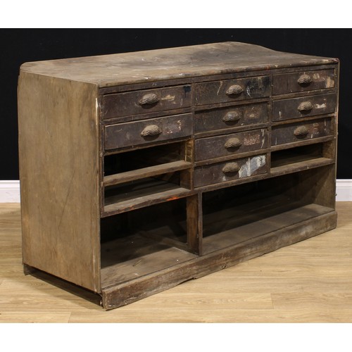 659 - Industrial Salvage - a printer’s or workshop chest, 88cm high, 148cm wide, 65cm deep