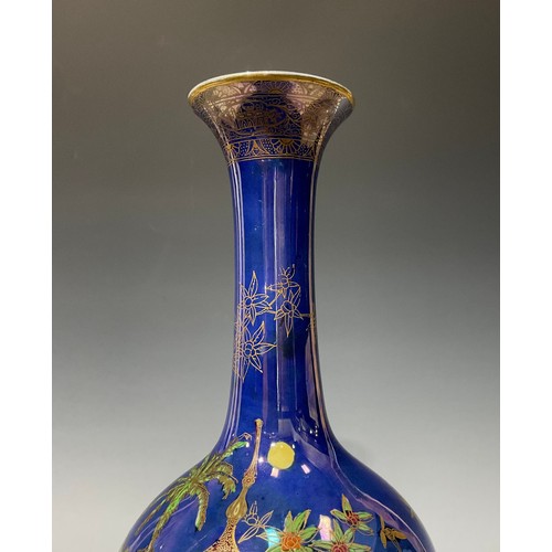 689 - A Carlton Ware Persian pattern lustre ovoid vase, decorated in polychrome with courtyard scene on bl... 