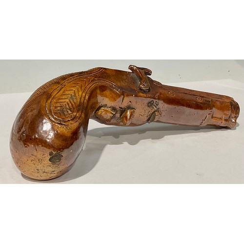 690 - A 19th century Derbyshire brown salt glazed novelty flask, in the form of a pistol, 25cm long, c.184... 