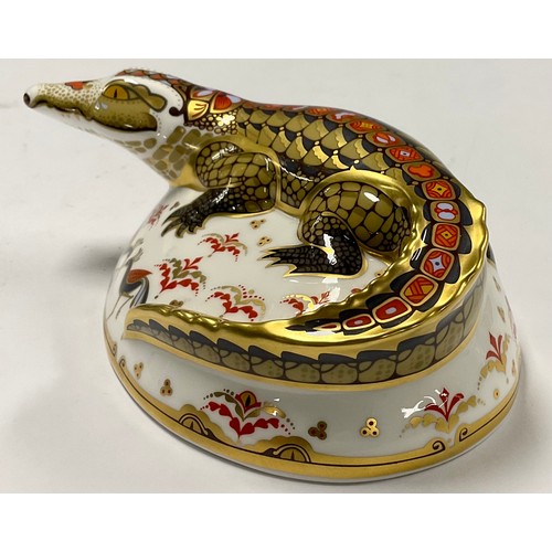 28 - A Royal Crown Derby paperweight, Crocodile, an exclusive gold signature edition commissioned by The ... 