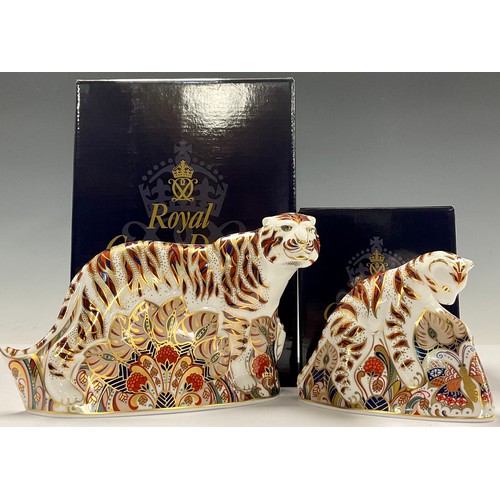 46 - An associated pair of Royal Crown Derby paperweights, Bengal Tiger and Bengal Tiger Cub, gold stoppe... 