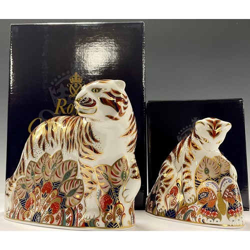 46 - An associated pair of Royal Crown Derby paperweights, Bengal Tiger and Bengal Tiger Cub, gold stoppe... 