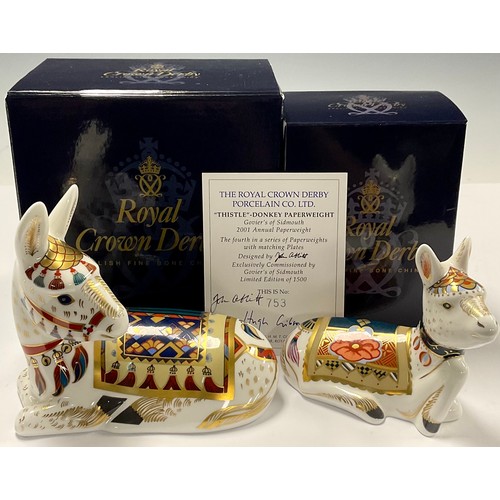 47 - An associated pair of Royal Crown Derby paperweights, Thistle Donkey, this is number 753 of a signat... 