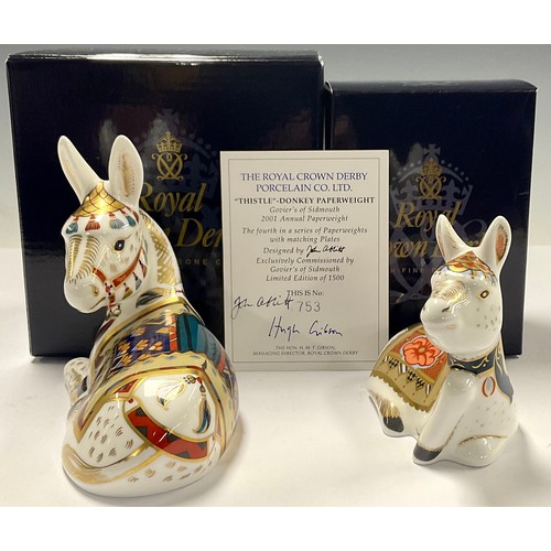 47 - An associated pair of Royal Crown Derby paperweights, Thistle Donkey, this is number 753 of a signat... 