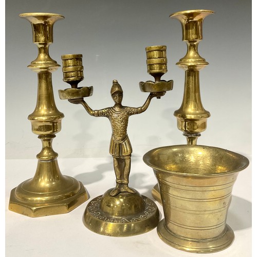 698 - An 18th century bronze mortar, 8cm high; a pair of Victorian brass ejector candlesticks; a bronze tw... 