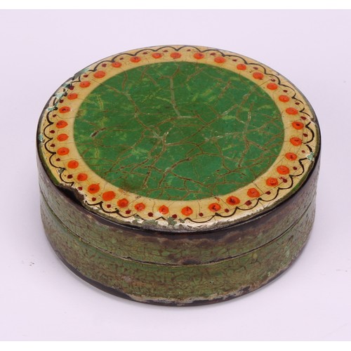 699 - An early 19th century vernis martin circular snuff box, the push-fitting cover decorated in gilt wit... 