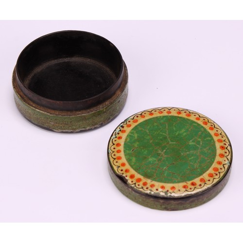 699 - An early 19th century vernis martin circular snuff box, the push-fitting cover decorated in gilt wit... 