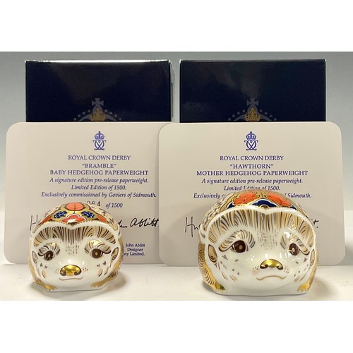 87 - A pair of Royal Crown Derby paperweights, Hawthorn Mother Hedgehog and Bramble Baby Hedgehog, both a... 