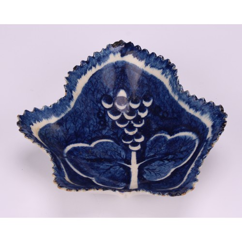 92 - A large Bow leaf shaped dish, painted in dark blue with vine, 19.5cm wide, pseudo-Chinese four-chara... 