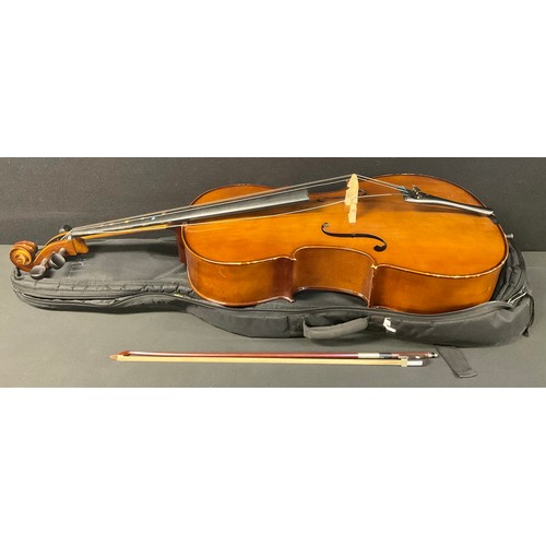 707 - Musical Instruments - a cello, with bow and carry case/bag