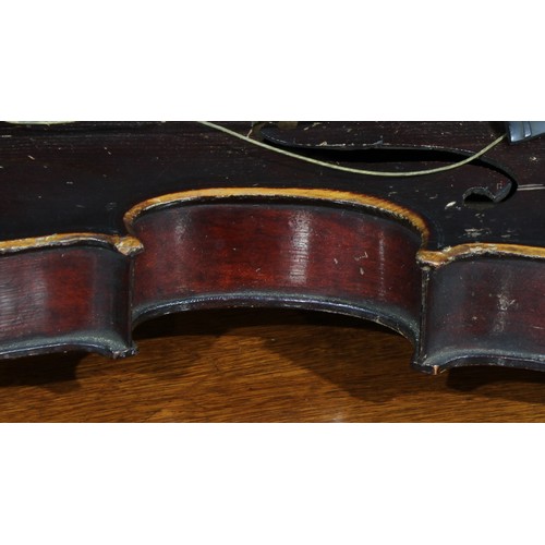 710 - Musical Instruments - a violin, the one-piece back 36cm excluding button, ebonised tuning pegs, 59cm... 