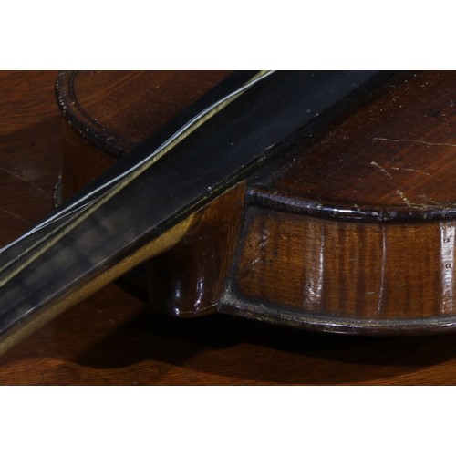 711 - Musical Instruments - a violin, the two-piece back 35.5cm excluding button, ebonised tuning pegs, ou... 